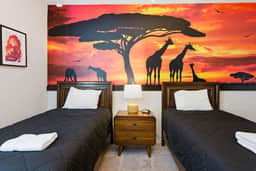 Upscale 9BR Stay with Pool and Themed Rooms - Image 5